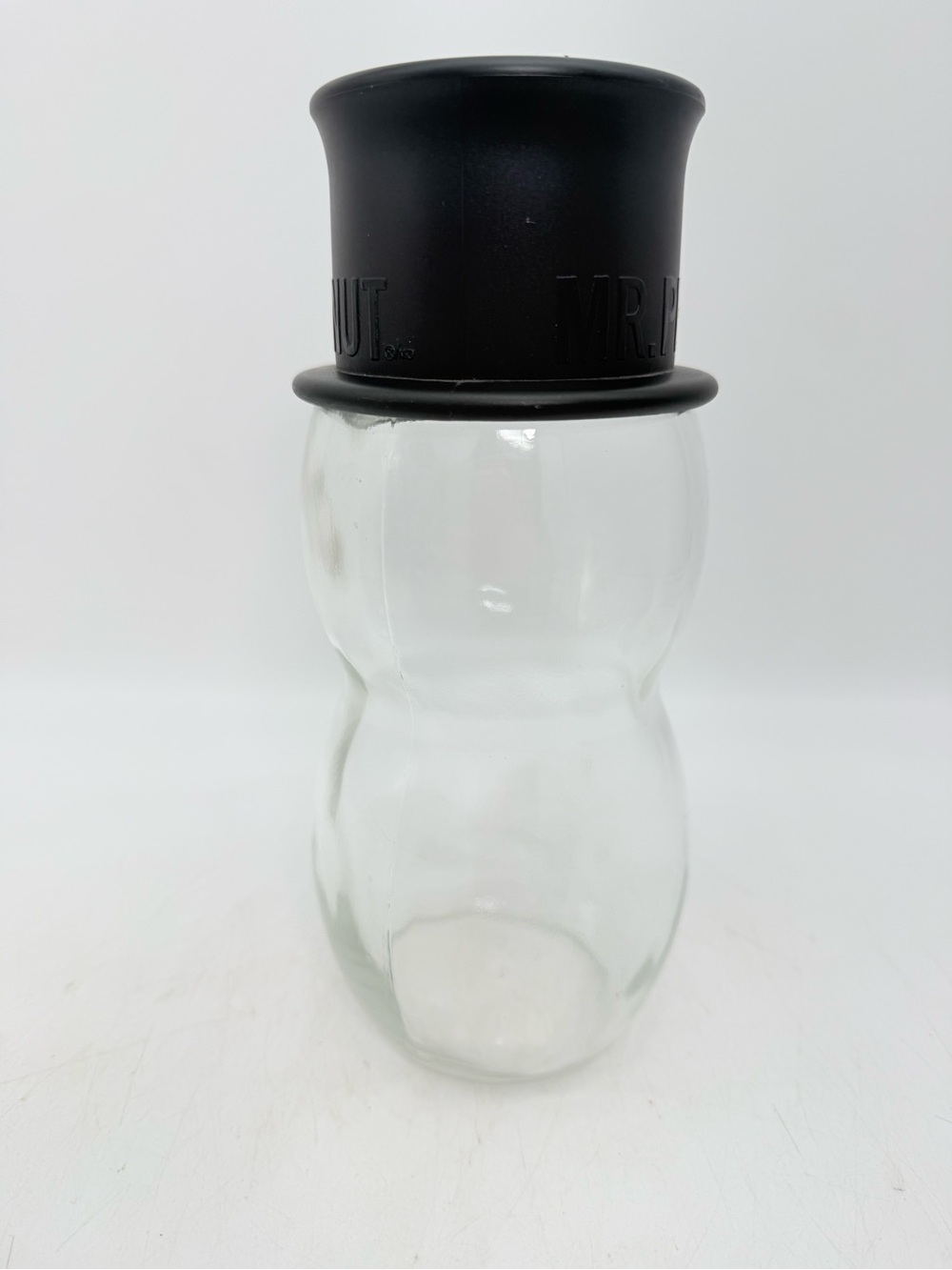 PLANTERS Peanuts clear glass jar peanut shaped with black plastic lid
